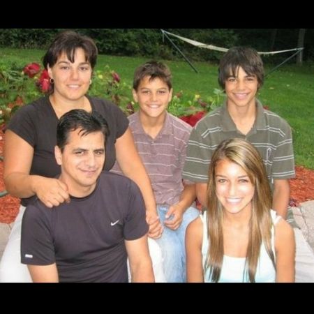 They all are posing for a picture.